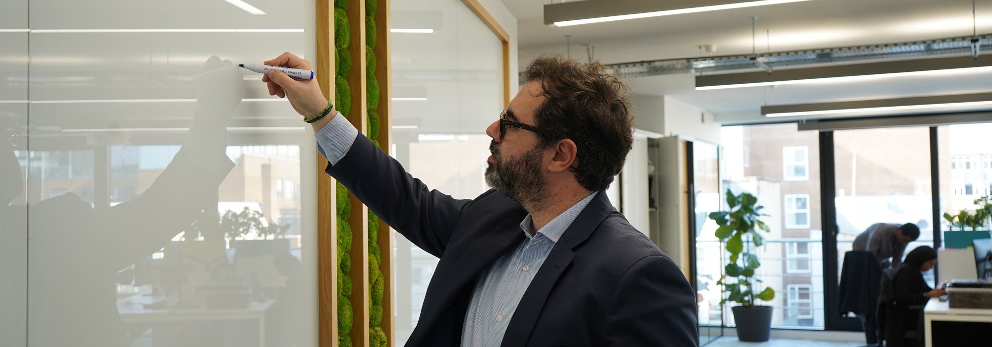 Decorative photo of Methods employees in Methods office