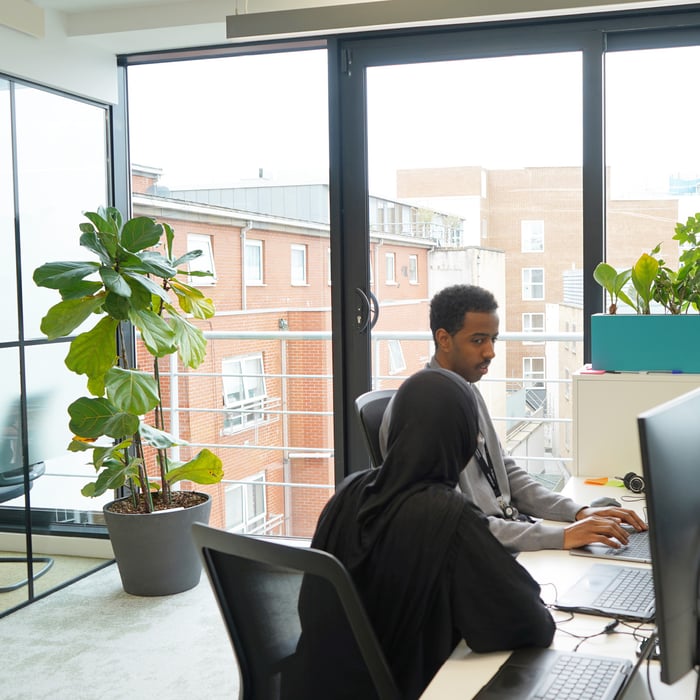 Decorative photo of Methods employees in Methods office