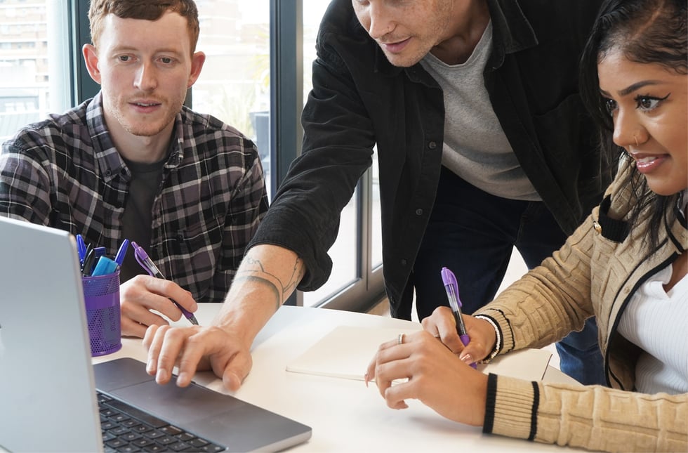 Decorative photo of Methods employees in Methods office Decorative photo of Methods employees in Methods office