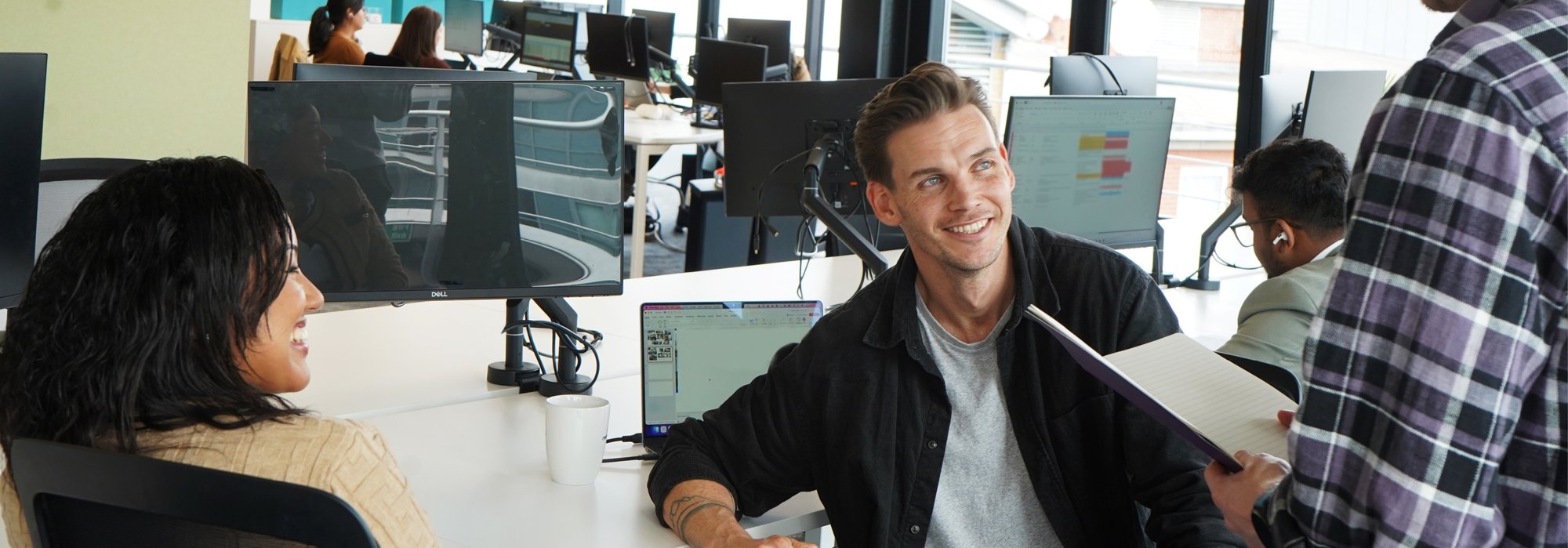 Decorative photo of Methods employees in Methods office