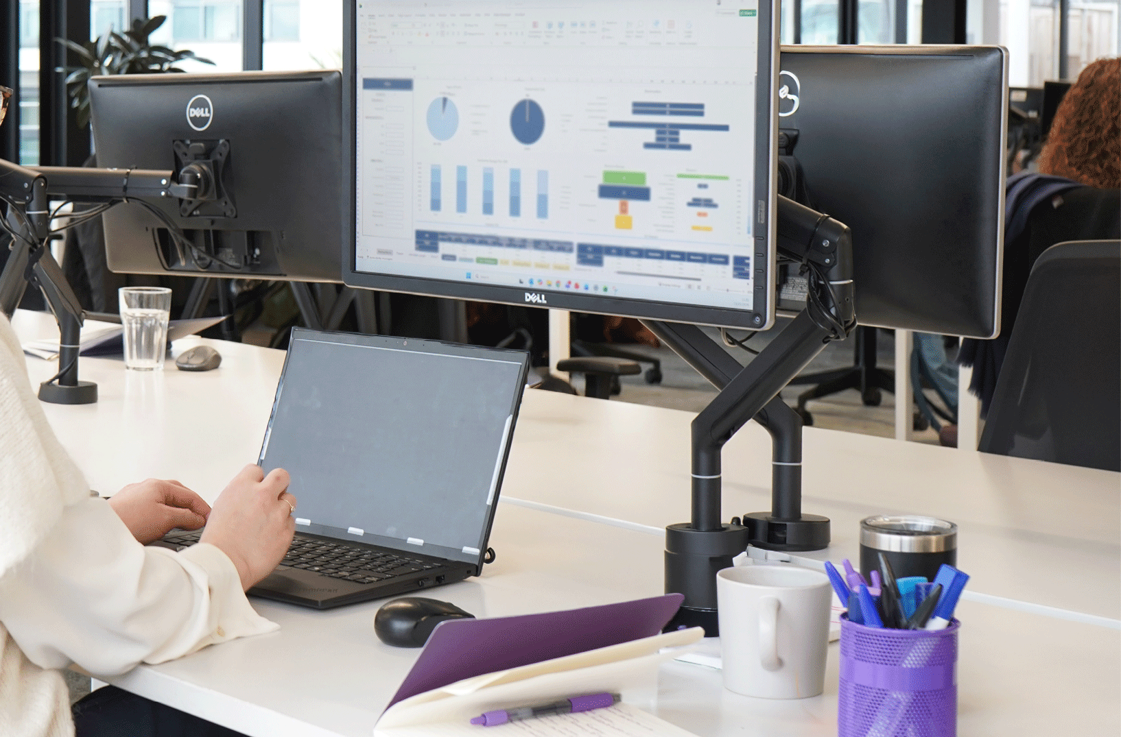 Decorative photo of Methods employees in Methods office