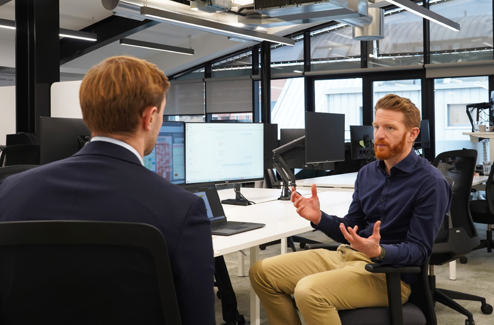 Decorative photo of Methods employees in Methods office