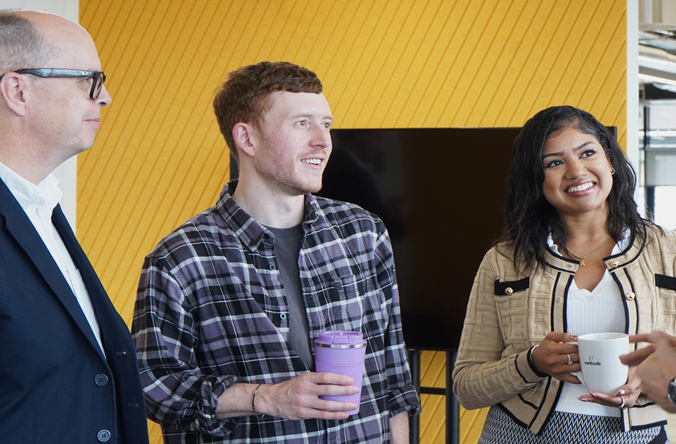 Decorative photo of Methods employees in Methods office Decorative photo of Methods employees in Methods office